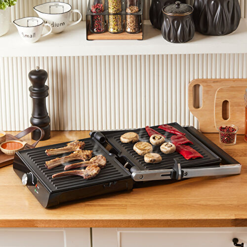 Homend Grilliant 1356H Inox Gövdeli Döküm Plakalı Tost ve Izgara Makinesi Homend Grilliant 1356H Inox Gövdeli Döküm Plakalı Tost ve Izgara Makinesi
