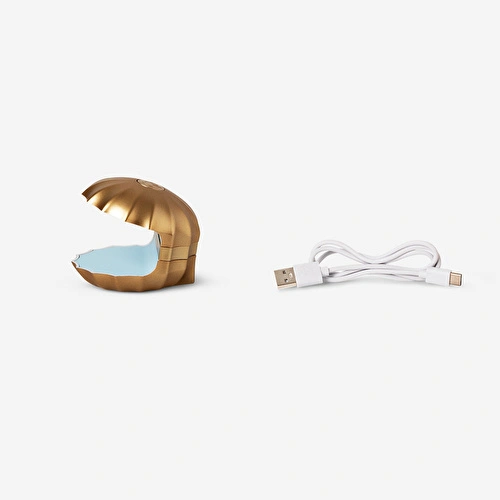 Flying Tiger Copenhagen Deniz Kabuğu Şeklinde Tırnak İçin Mini UV Lamba Flying Tiger Copenhagen Deniz Kabuğu Şeklinde Tırnak İçin Mini UV Lamba